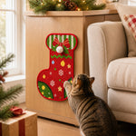 Christmas stocking cat scratcher attached to furniture
