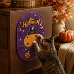 Purple Halloween cat scratcher attached to furniture