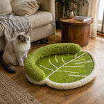 Leaf cat scratcher lounge beside modern home furniture