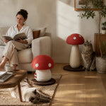 Red mushroom cat scratchers styled in a shared living room