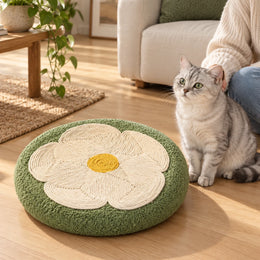 Sage flower sisal cat scratcher in a shared living room