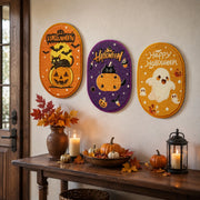 Halloween cat scratchers displayed on a wall