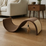 S-curve cat scratcher lounge styled beside a modern sofa