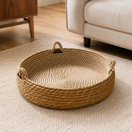 Natural woven cat scratcher basket styled in a modern living room