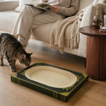 Decorative book-shaped cat scratcher styled in a modern living room