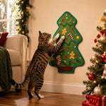 Cat scratching a green Christmas tree sisal mat