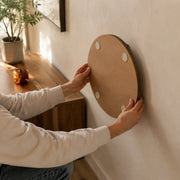 Four adhesive mounting pads on the back of the Basic scratcher
