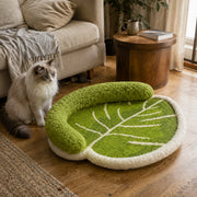 Leaf cat scratcher lounge beside modern home furniture