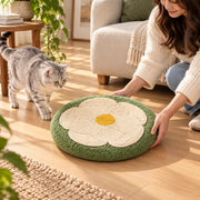 Owner repositioning the lightweight flower cat scratcher