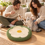 Couple and cat sharing playtime with the flower scratcher